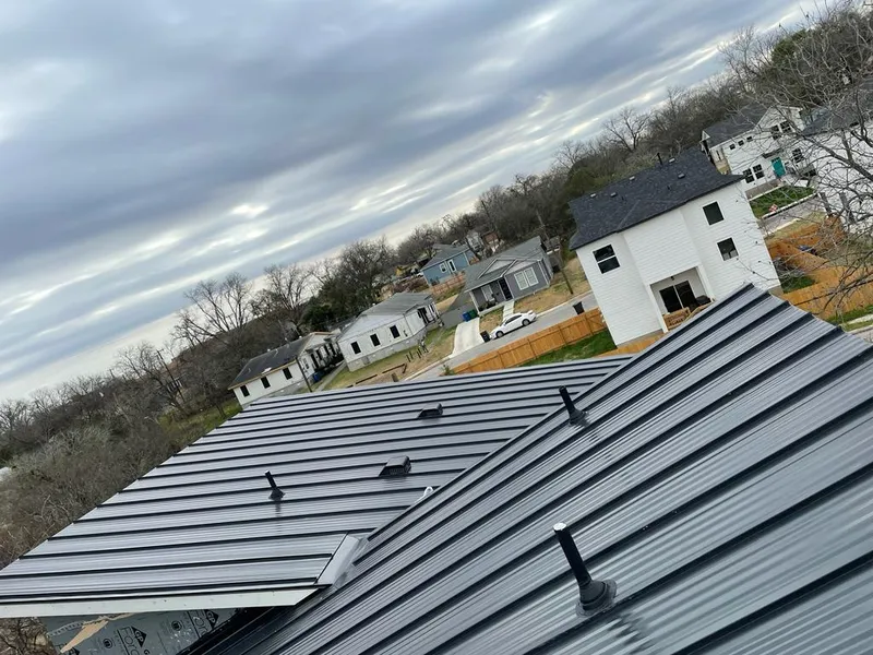 Standing seam metal roof panels with vents for Skylight Repair in Newington